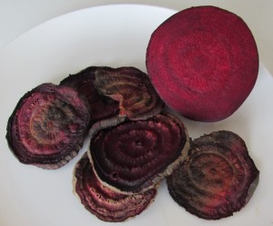 browned slices of beets, ready to be chopped and steeped in simmering water